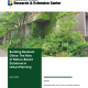 Cover of Nature Based Solutions paper showing a concrete building with greenery on it.