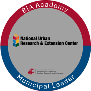 BIA Academy digital badge Circle logo with the words BIA Academy at the top and Municipal Leader at the bottom, Logos for NUREC and the WSU Metropolitan Center are in the middle
